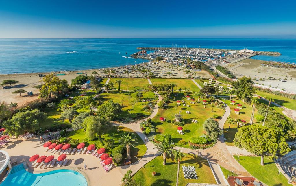 an aerial view of the resort and the beach at St Raphael Resort in Limassol