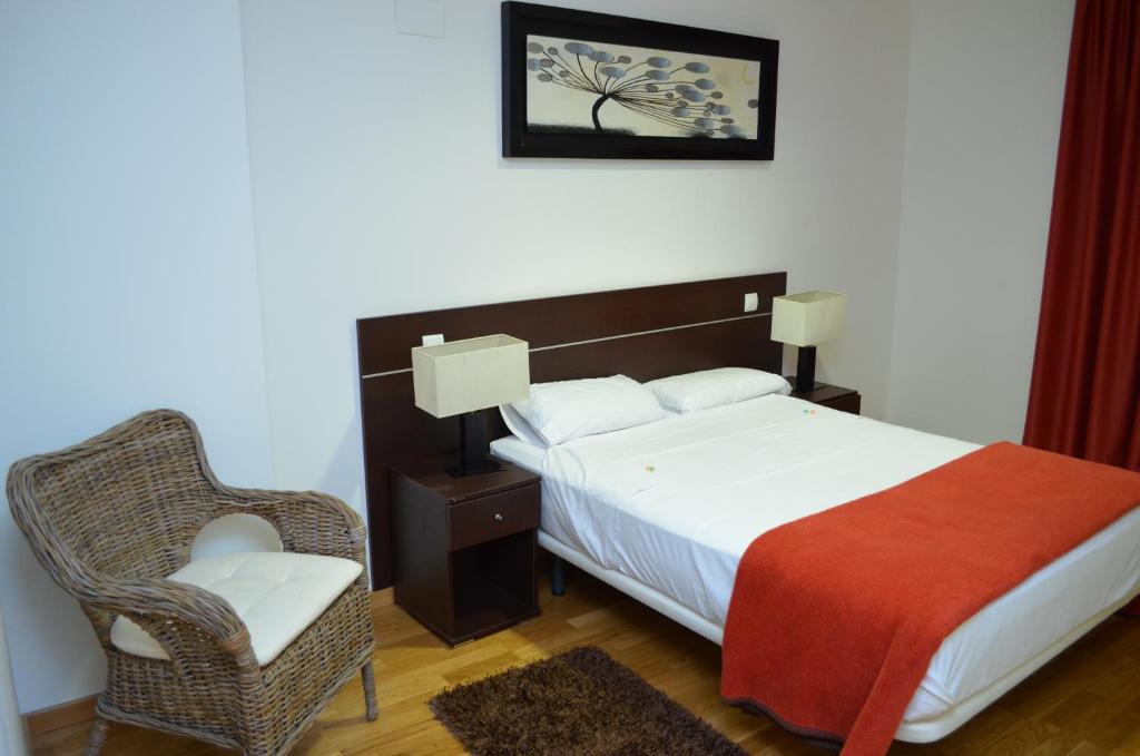 Postel nebo postele na pokoji v ubytování Casa Palacio de los Sitios