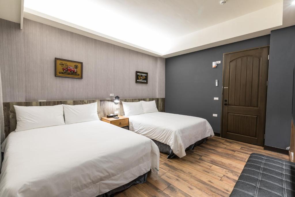 Postel nebo postele na pokoji v ubytování Peach blossom B&B