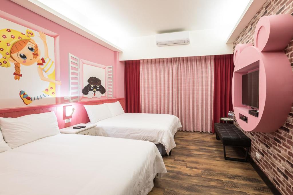 Postel nebo postele na pokoji v ubytování Peach blossom B&B
