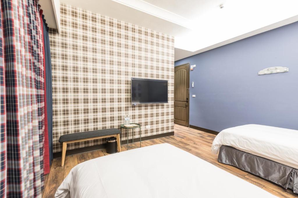 Postel nebo postele na pokoji v ubytování Peach blossom B&B