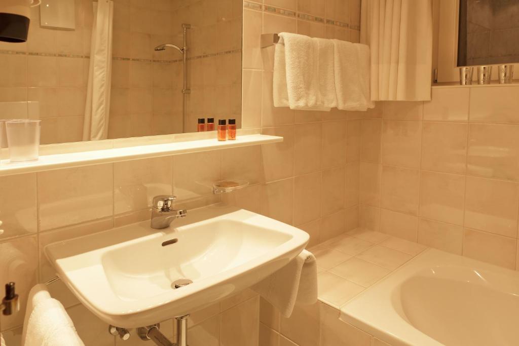Kúpeľňa v ubytovaní Pension Gallus