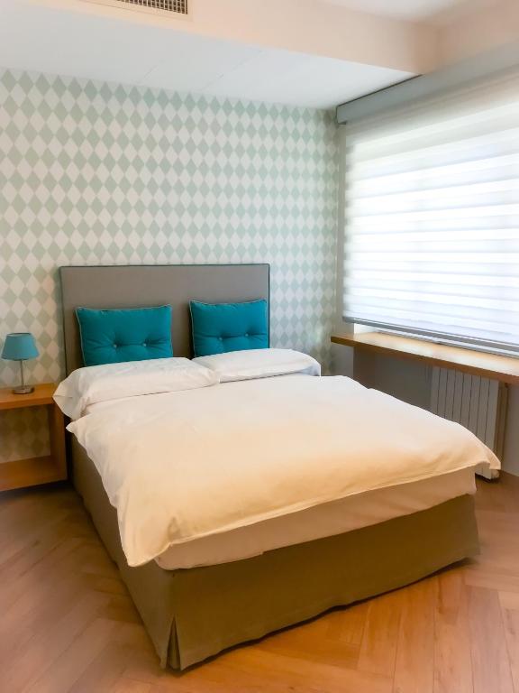 Postel nebo postele na pokoji v ubytování B&B Verù