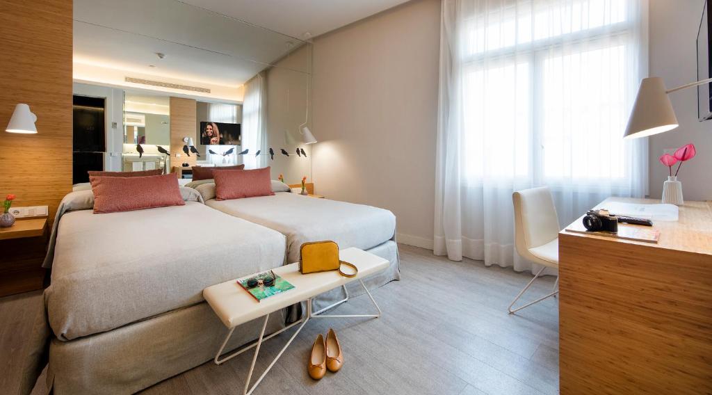 Giường trong phòng chung tại Park Hotel