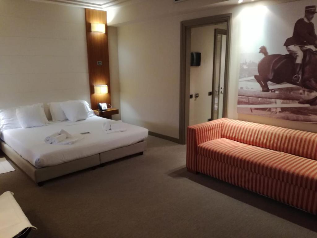 Postel nebo postele na pokoji v ubytování Hotel Barrage