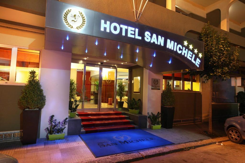 a hotel with a sign on the front of it at Hotel San Michele in Milazzo