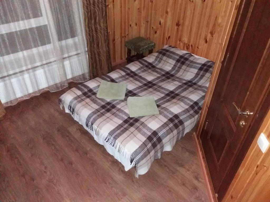 Postel nebo postele na pokoji v ubytování Hotel Dudarik