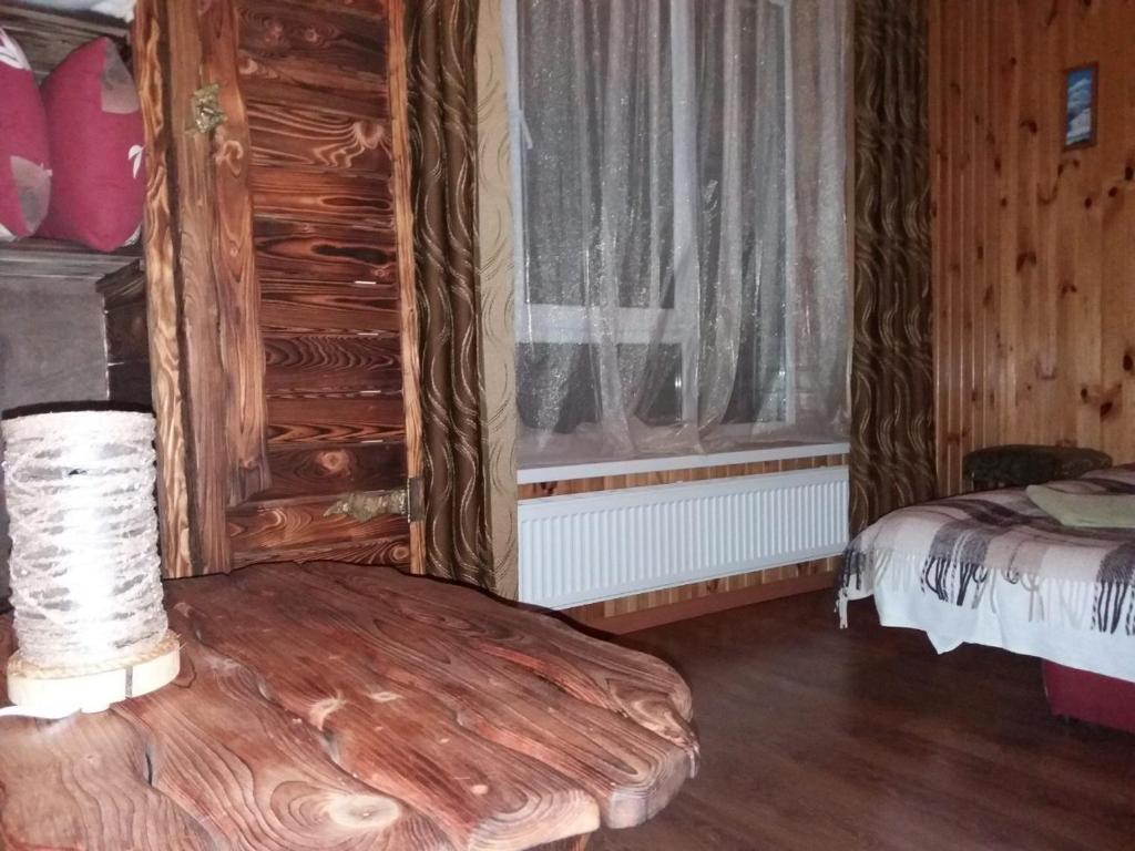 Postel nebo postele na pokoji v ubytování Hotel Dudarik