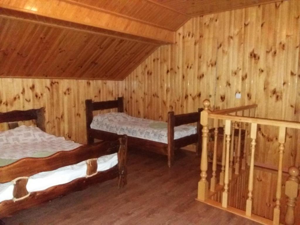 Postel nebo postele na pokoji v ubytování Hotel Dudarik