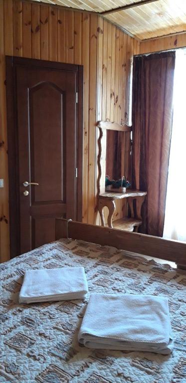 Postel nebo postele na pokoji v ubytování Hotel Dudarik