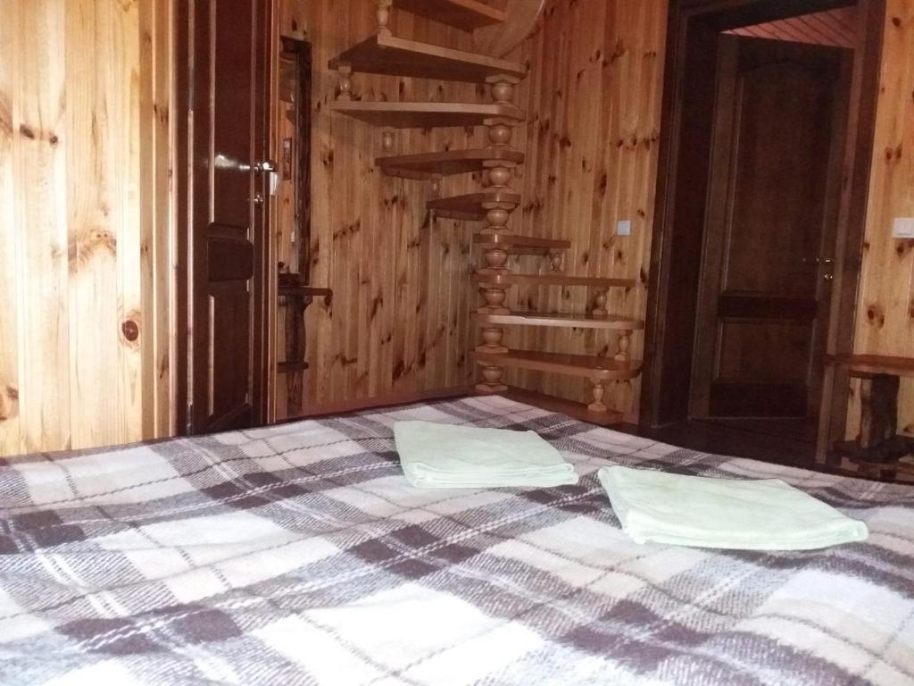 Postel nebo postele na pokoji v ubytování Hotel Dudarik