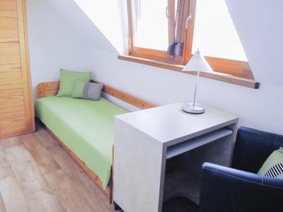 Postel nebo postele na pokoji v ubytování Apartman Diófa