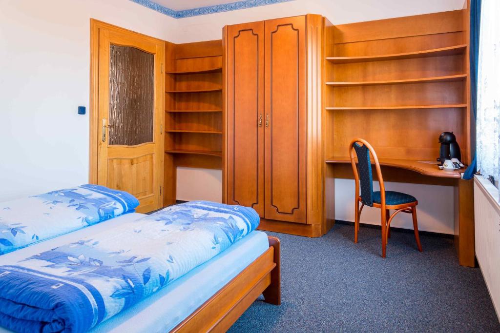 Postel nebo postele na pokoji v ubytování Villa Karolina