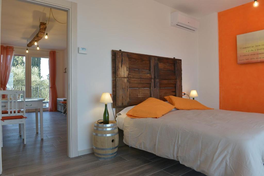 A bed or beds in a room at Agriturismo La Guarda