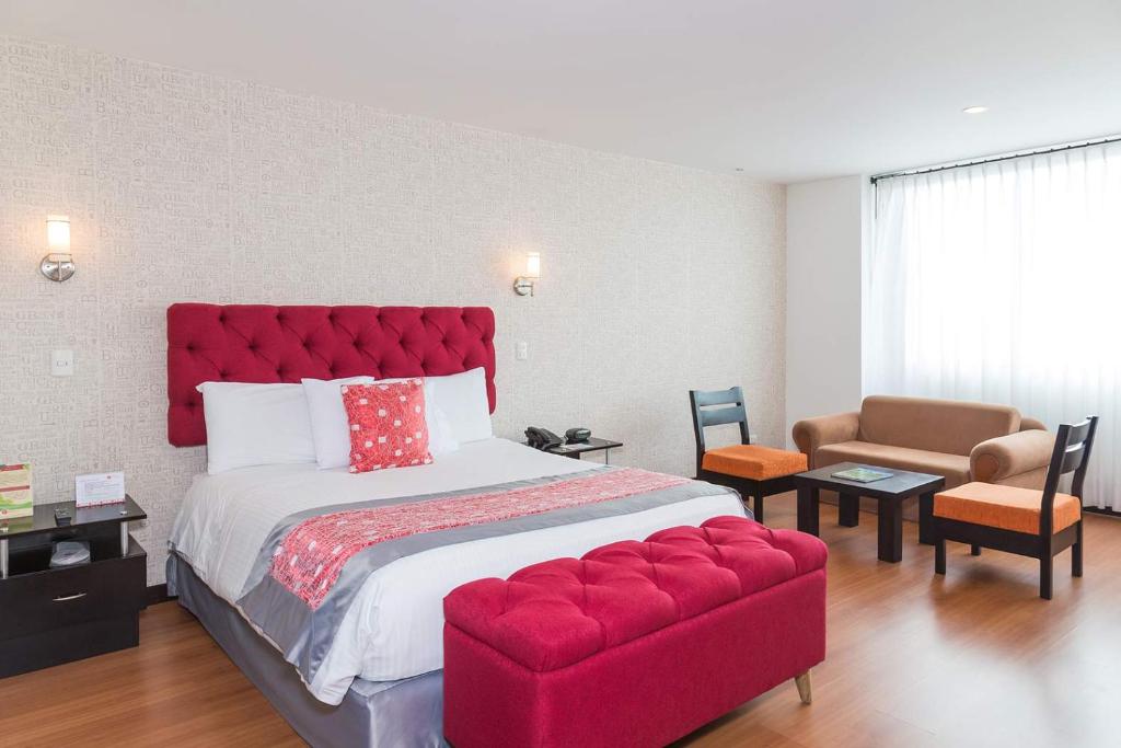Postel nebo postele na pokoji v ubytování Hotel Varuna