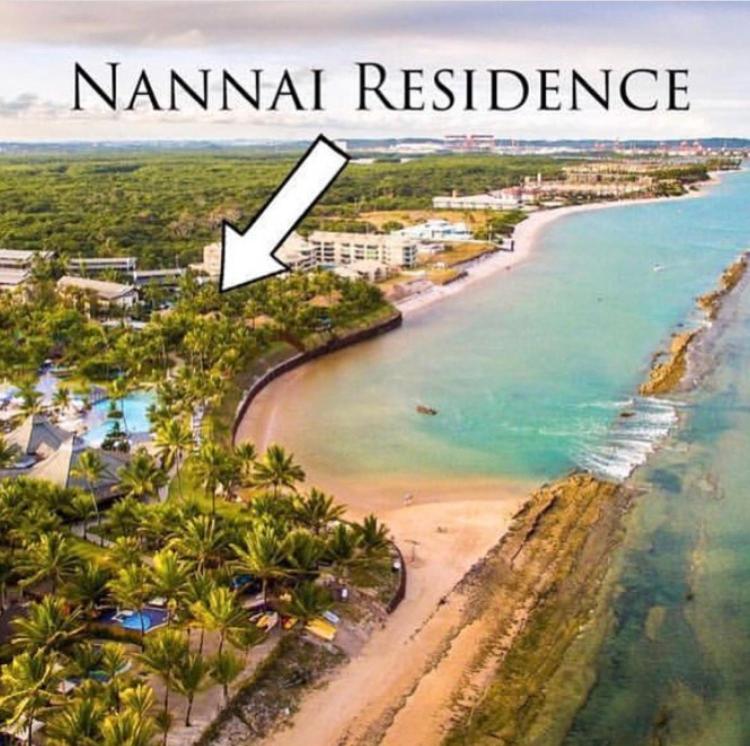 an aerial view of a beach with the words normal residence at NANNAI RESIDENCE in Porto De Galinhas