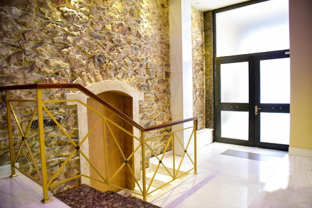 Postel nebo postele na pokoji v ubytování Eva Hotel Piraeus