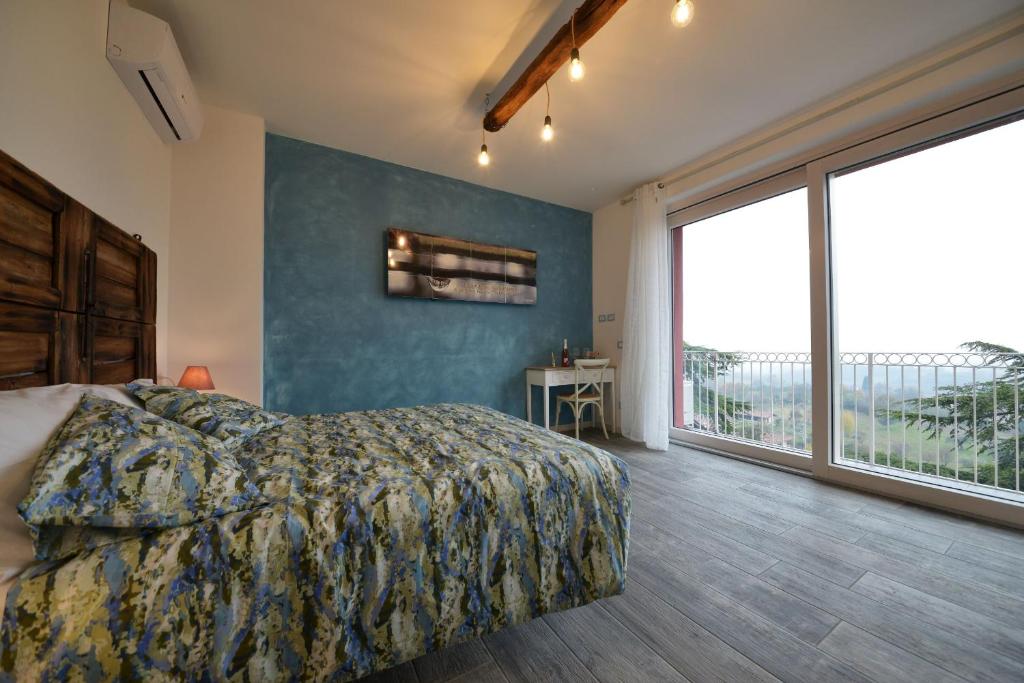A bed or beds in a room at Agriturismo La Guarda