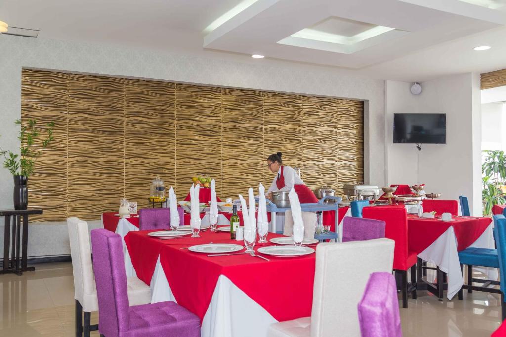 TV a/nebo společenská místnost v ubytování Hotel Varuna