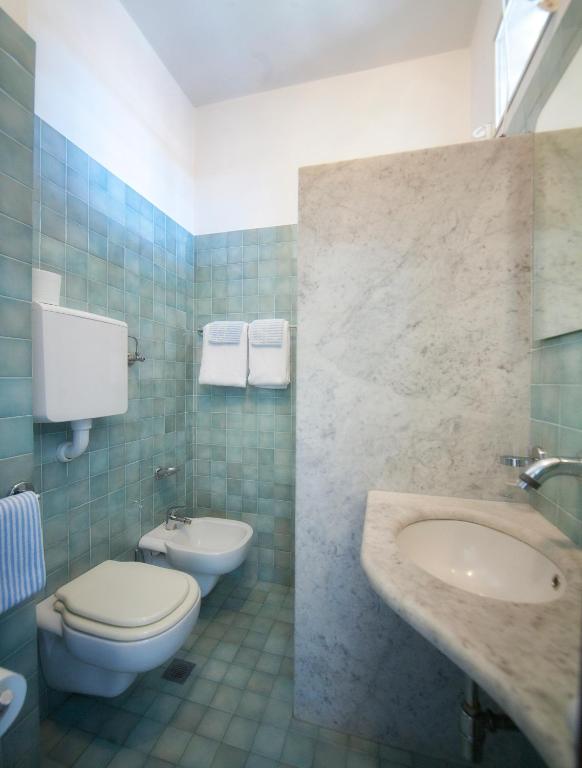 Koupelna v ubytování Hotel Norma