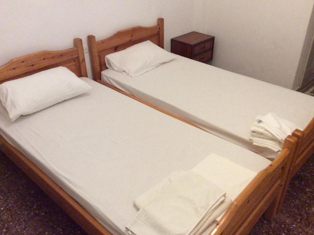 Postel nebo postele na pokoji v ubytování Anixi
