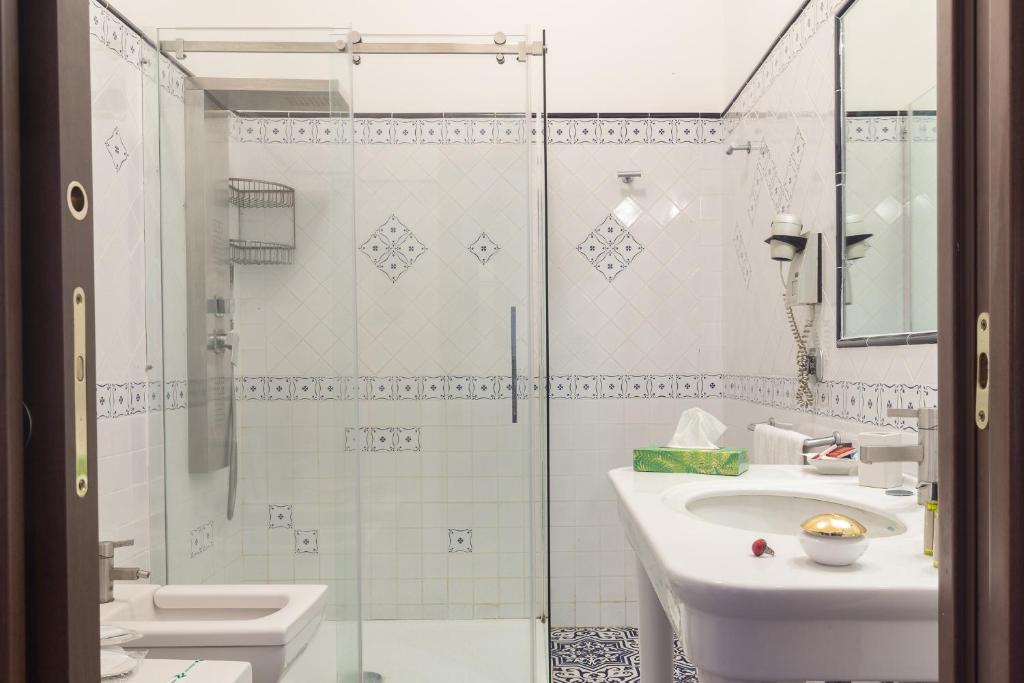 Koupelna v ubytování Hotel Eros