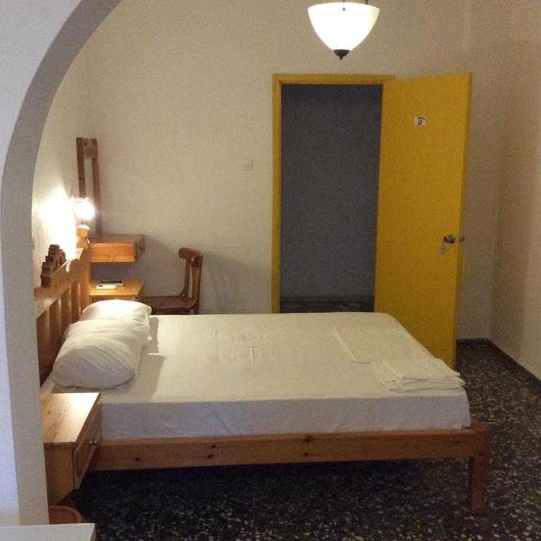 Postel nebo postele na pokoji v ubytování Anixi