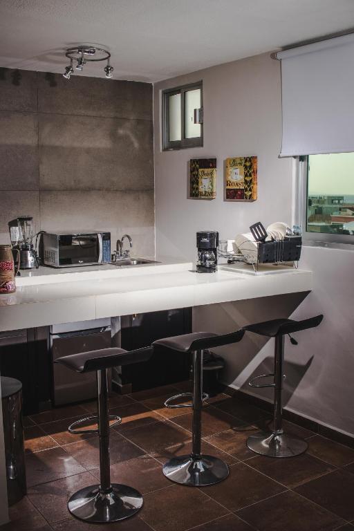 Kuchyň nebo kuchyňský kout v ubytování HOTEL CAREYES