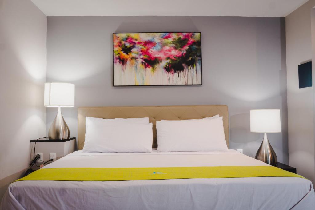 Postel nebo postele na pokoji v ubytování HOTEL CAREYES