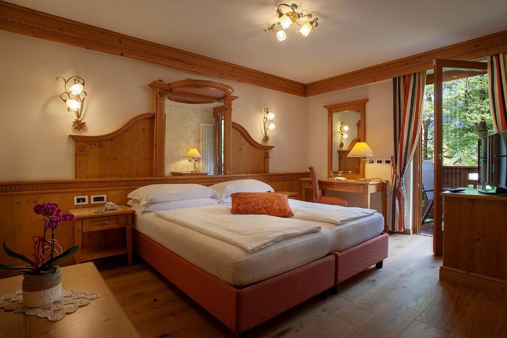 Postel nebo postele na pokoji v ubytování Active Hotel Monte Giner