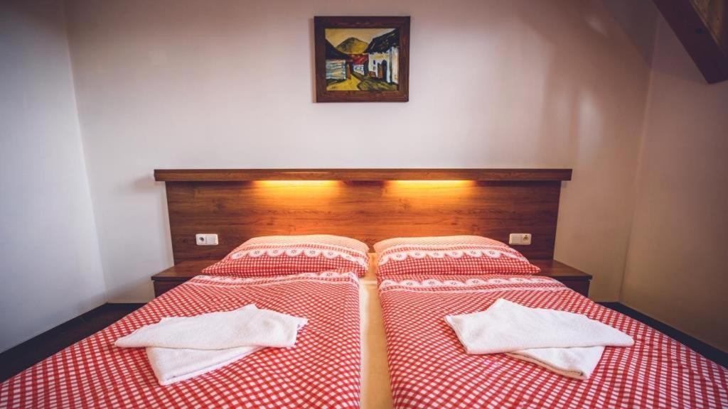 Posteľ alebo postele v izbe v ubytovaní Penzion Pribisko