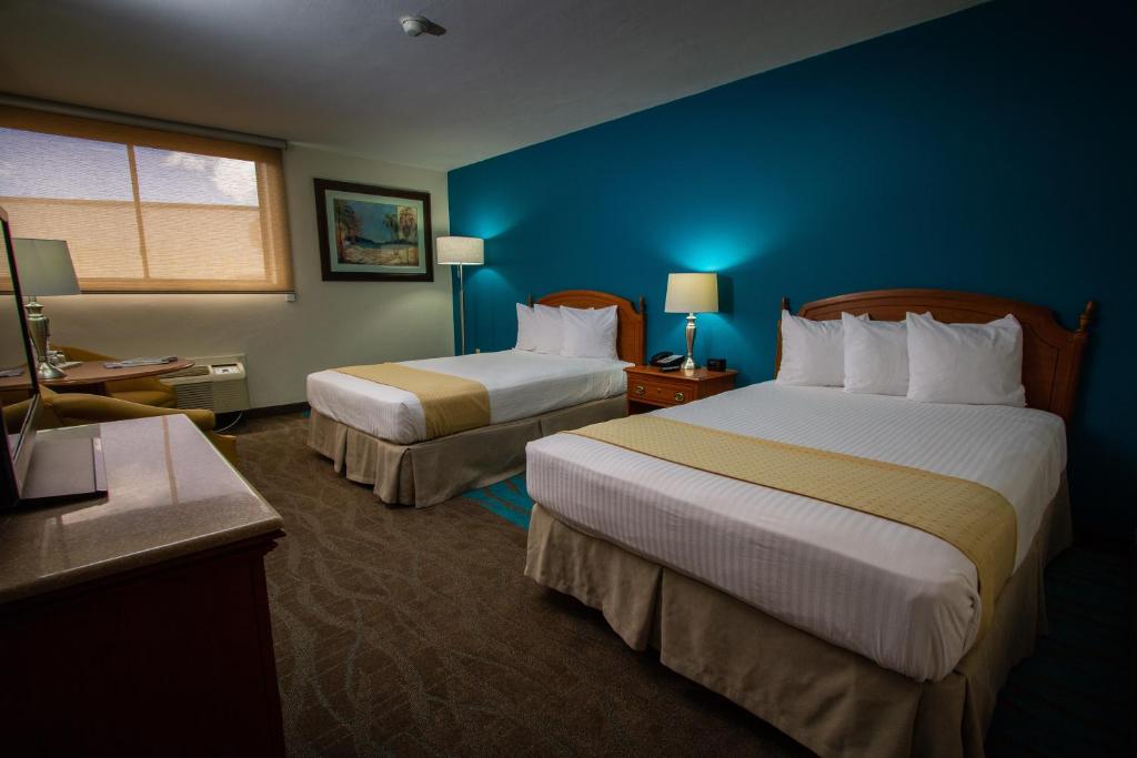 Postel nebo postele na pokoji v ubytování Caribe Hotel Ponce