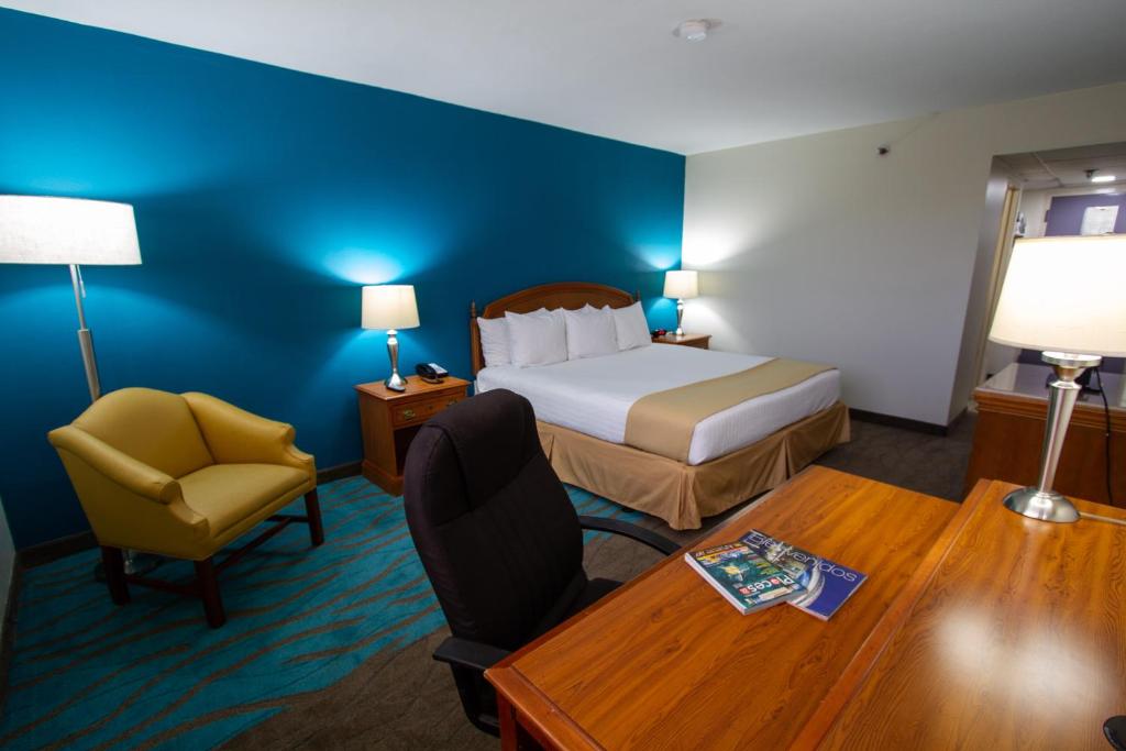 Postel nebo postele na pokoji v ubytování Caribe Hotel Ponce