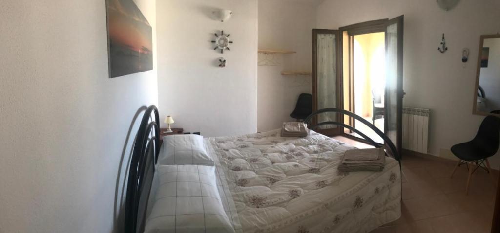 Łóżko lub łóżka w pokoju w obiekcie B&B Villa Tancau