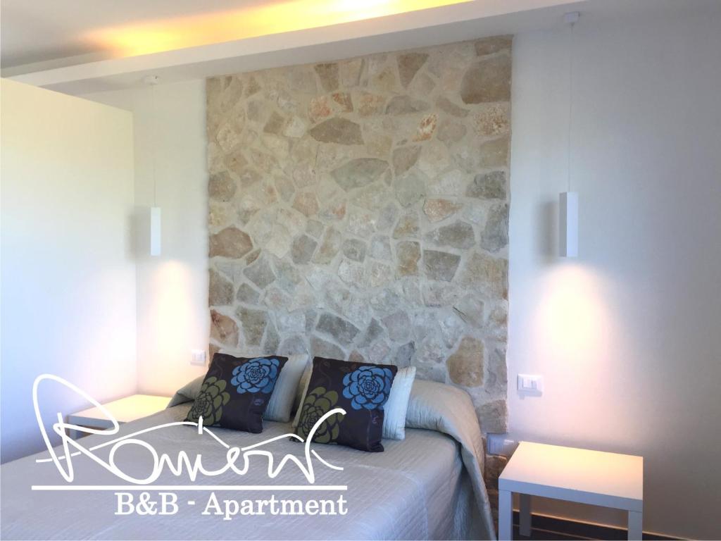 Postel nebo postele na pokoji v ubytování Ranieri Events and B&B
