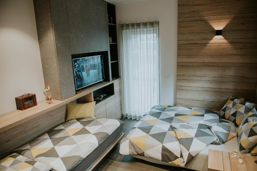 Postel nebo postele na pokoji v ubytování Vila Mojca Apartments Jasna & Jelka