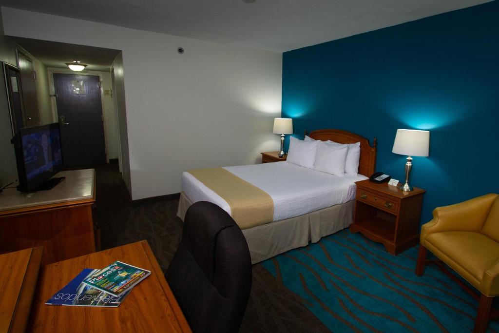 Postel nebo postele na pokoji v ubytování Caribe Hotel Ponce