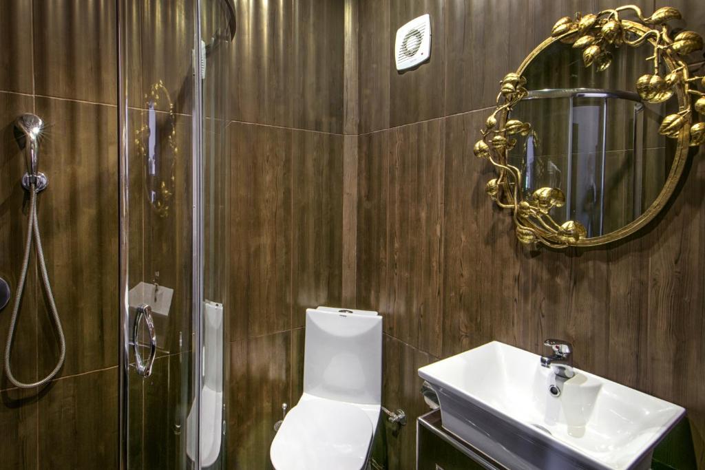 Koupelna v ubytování Leandros Hotel