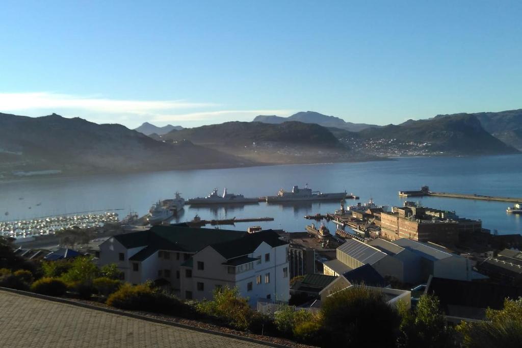 a view of a city and a body of water at Harbour Views in Simonʼs Town