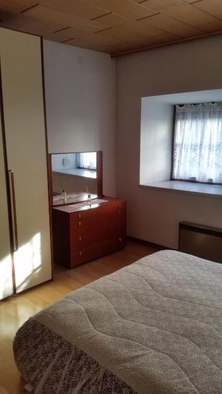 Postel nebo postele na pokoji v ubytování La Perla della Drava
