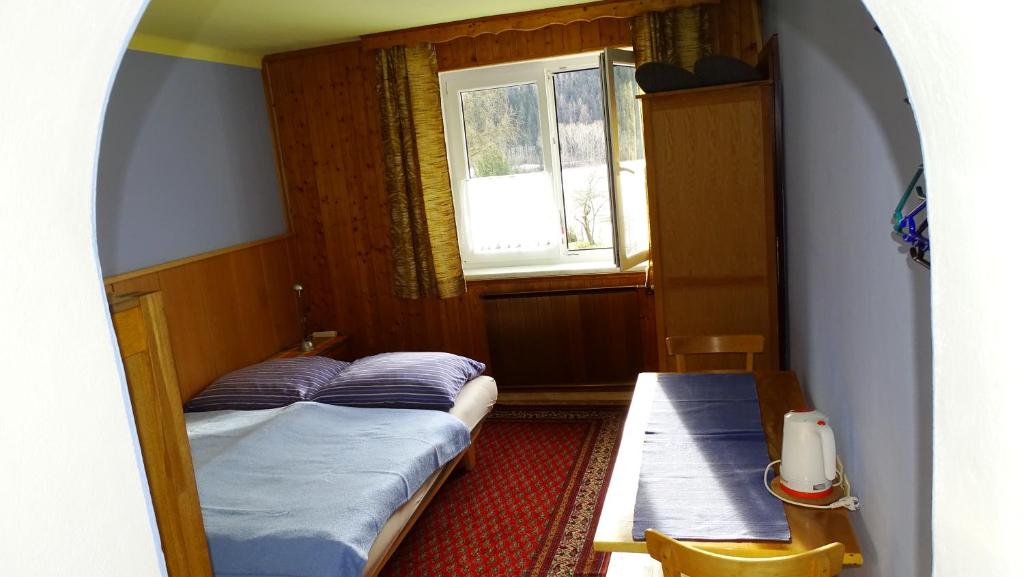 Postel nebo postele na pokoji v ubytování Ferienhaus-Römerthurm