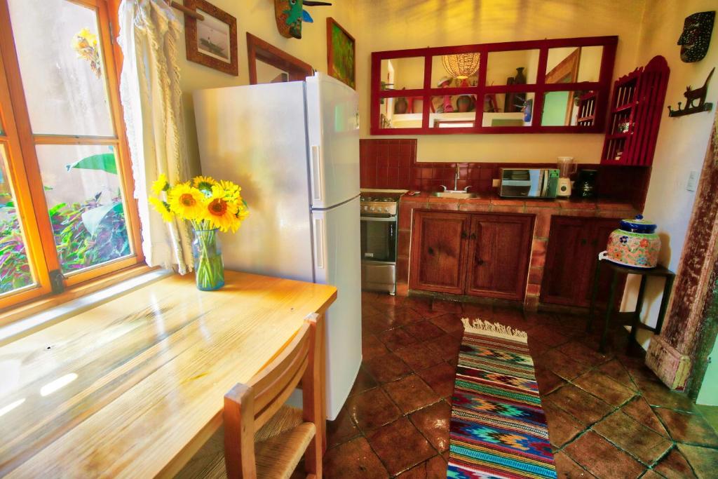 Kuchyň nebo kuchyňský kout v ubytování Hotel Casa Encantada