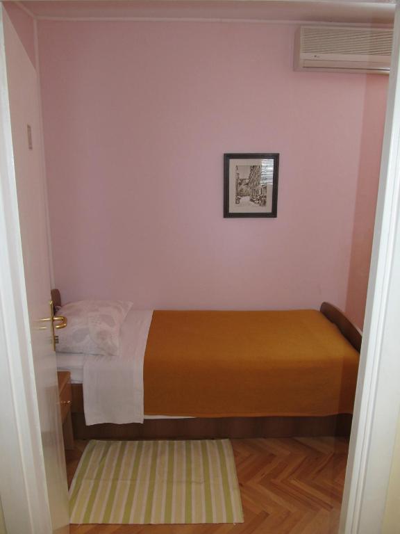 Posteľ alebo postele v izbe v ubytovaní Sinistaj Rooms