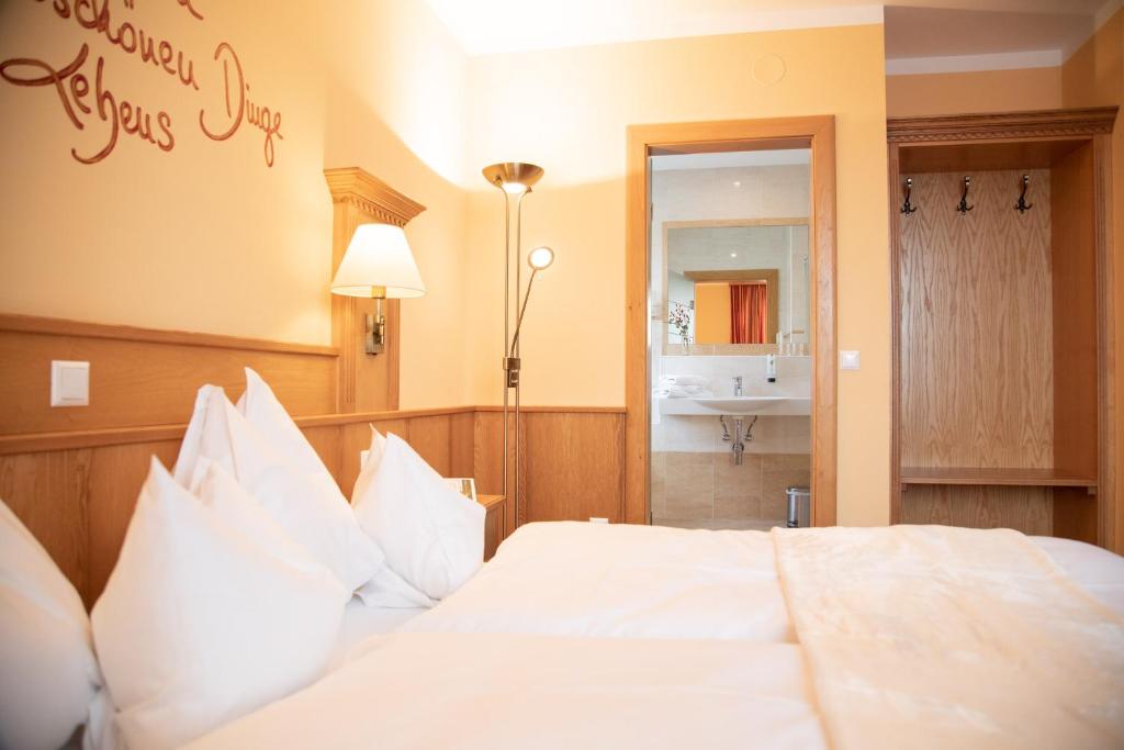 Postel nebo postele na pokoji v ubytování Bed and Breakfast Mittelkärnten