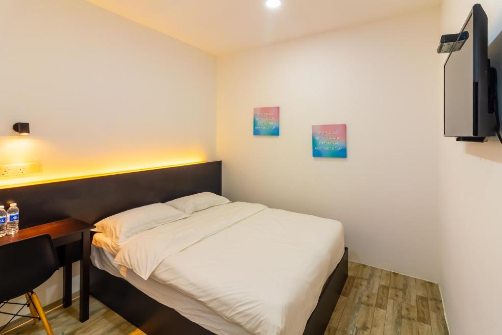 TV a/nebo společenská místnost v ubytování Tambun Warm Hotel