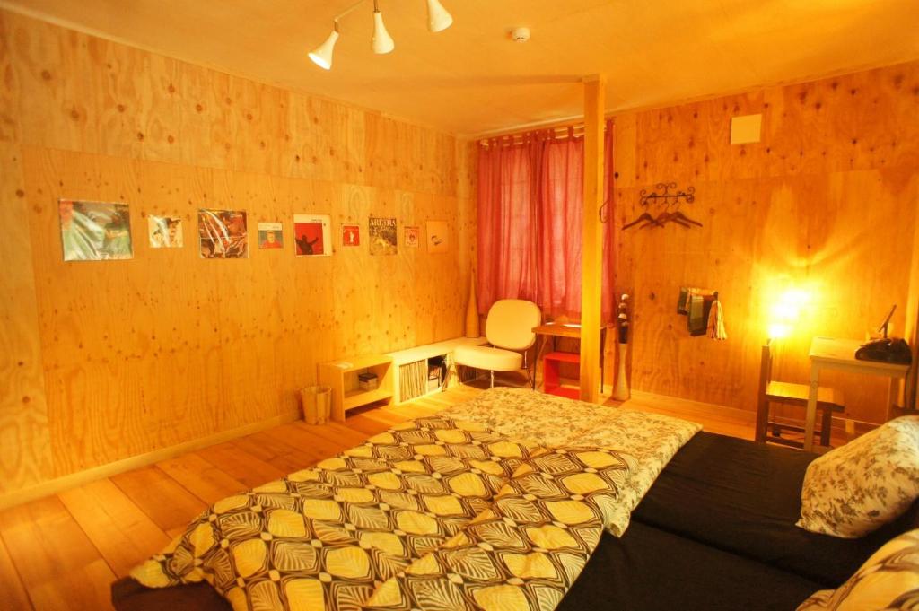 Postel nebo postele na pokoji v ubytování Saku Cafe