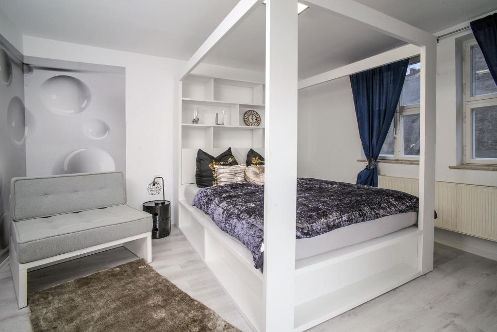 Postel nebo postele na pokoji v ubytování Designpension Traumschloss Hotel Garni