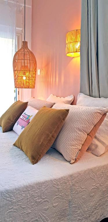 Postel nebo postele na pokoji v ubytování LA BOHEME, résidence de 5 appartements avec piscine, vue océan, Petite Ile