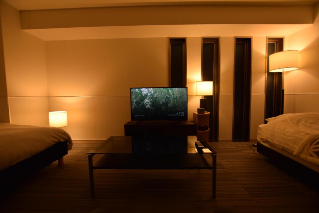TV a/nebo společenská místnost v ubytování Residence Condominium KALAHAAI