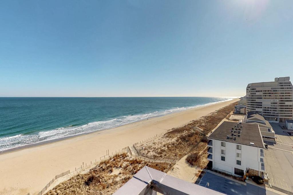 an aerial view of a beach with buildings and the ocean at Sea Terrace Serenity in Ocean City